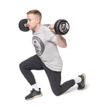 male model doing lunge with fixed curl barbell