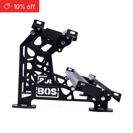 Bells of Steel Commercial Interchangeable Weight Rack black metal bracket with geometric cutouts, displayed on white. Perfect for mounting swappable storage in home gyms. Red tag at top left shows “10% off” with price icon.