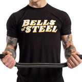 A person wearing a black Bells of Steel T-shirt grips the EZ Curl Bar (54.5”) with both hands, their tattooed arms highlighted against a plain white background, showcasing strength and arm definition.