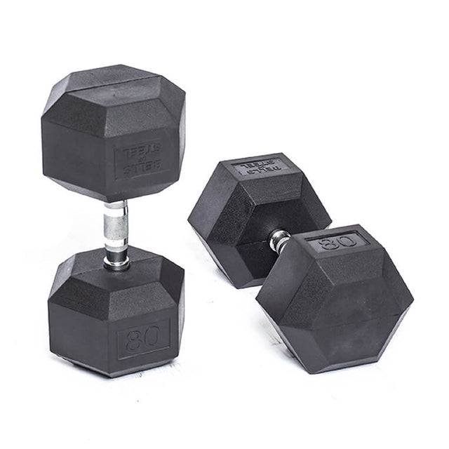 Three Bells of Steel Ergo Rubber Hex Dumbbells with silver handles are set against a white background. One stands upright, while two lie down, each showing "80". These durable weights include ergonomic grips for comfort during intense workouts.