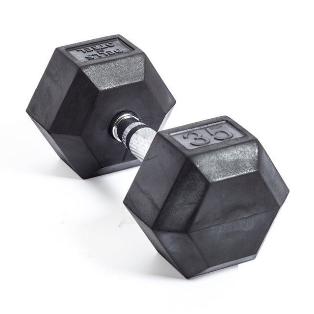 A single Ergo Rubber Hex Dumbbell from Bells of Steel, featuring a black hexagonal design and ergonomic silver grip, rests on a white surface with the embossed weight "35," highlighting its commercial-grade durability.