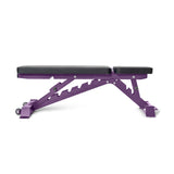 The Buzz-Saw Heavy-Duty Adjustable Bench by Bells of Steel features a purple frame with a padded black seat and backrest, made from heavy-duty steel. Set flat on a white background, its sleek design and sturdy build make it perfect for diversifying your exercise routine.