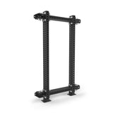 The Bells of Steel Manticore Folding Power Rack Builder (3" x 3", 1" Holes) is a rectangular black metal rack with multiple holes, corner brackets, and base plates—ideal for a compact home gym setup.