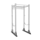 The silver and black Manticore Flat Foot Components by Bells of Steel feature multiple holes for adjustable attachments, a top pull-up bar, bottom support bands, and showcase a reinforced design with the brand name on the upper section.