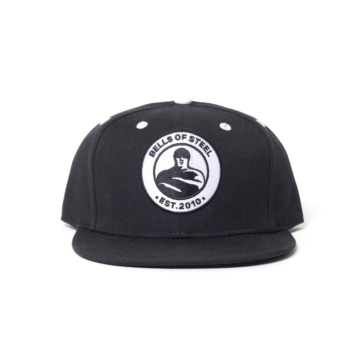 The Bells of Steel Snap Back Hat is a black flat-brim cap with a round white patch on the front, featuring "BELLS OF STEEL EST. 2010" and a kettlebell lifter—perfect for gym enthusiasts seeking style and shade.