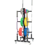 The Hydra Bumper Plate Tree Builder by Bells of Steel is a modular storage unit on wheels for easy mobility, holding colorful plates—red, green, yellow, blue—and two workout bars with a sleek black metal frame.