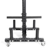 The Hydra Bumper Plate Tree Builder from Bells of Steel features a black metal base with adjustable holes, four vertical cylindrical holders for organization, casters for easy mobility, and a sturdy, industrial design that complements the Hydra ecosystem's modular storage unit.