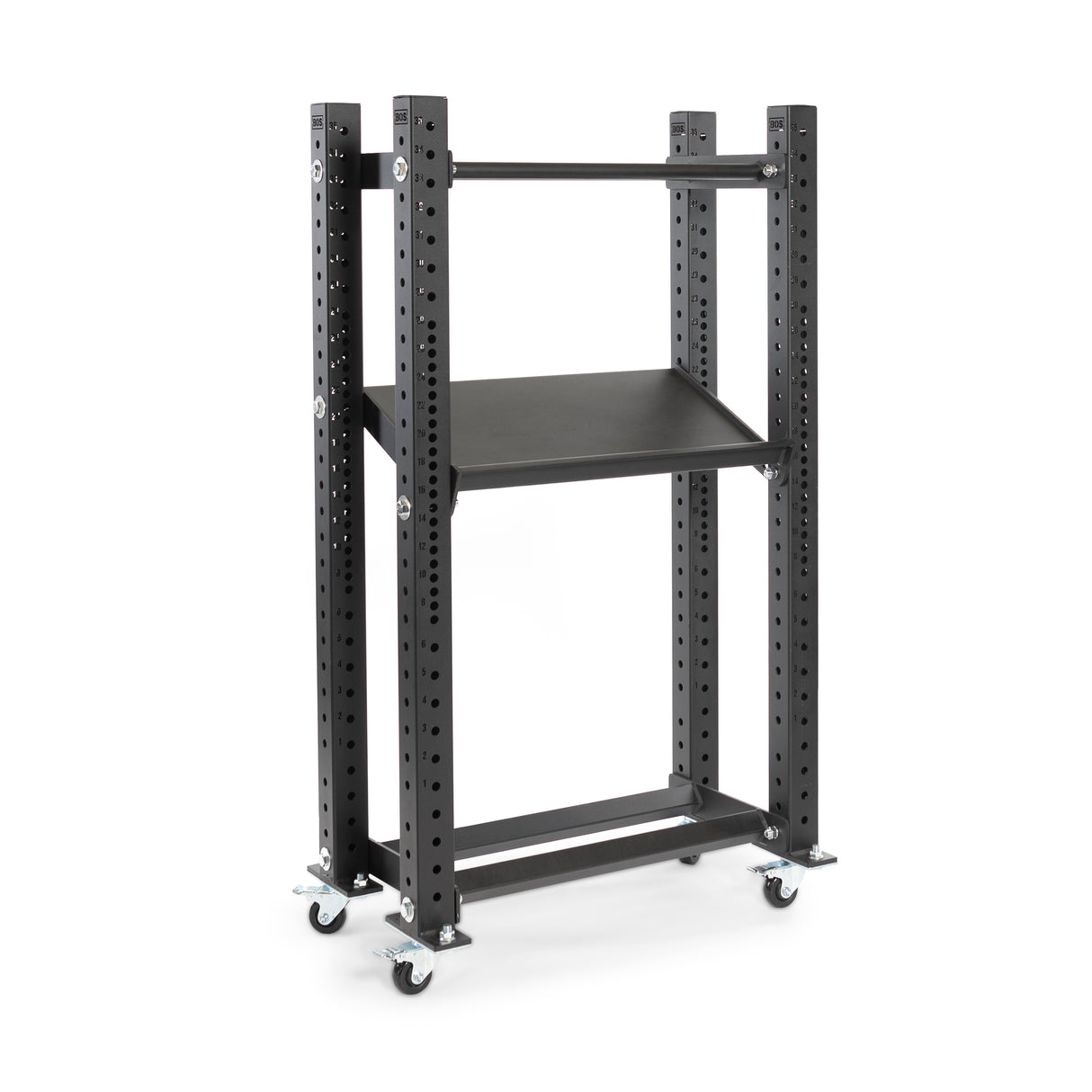 The Hydra Storage Builder by Bells of Steel is a black, adjustable utility cart with perforated metal sides and a modular design. It features a flat top shelf, lower angled shelf, and caster wheels, ideal for versatile storage and mobility in your home gym.