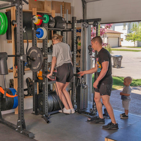 lifestyle picture of male and female model working out on hydra universal storage