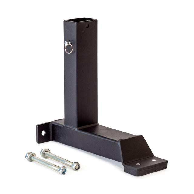 A black metal Bench Attachment by Bells of Steel, featuring a square vertical socket and horizontal base, embodies the rugged functionality of a Hero Bench. Two silver bolts with washers lie beside it on a white background, ready for assembly.