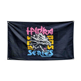 This Bells of Steel flag showcases a black background with an eye-catching stylized dragon head illustration in the center. Featuring the words "Hydra Bass Series" above and below the dragon in bold, vibrant fonts, this flag is an ideal addition for your home gym decor, injecting fierce energy into your workout space.