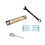 A Bells of Steel Hydra Hardware kit, featuring a metal nameplate, a wrench, a BOS-labeled key, and a set of screws, is displayed on a white background, evoking the essence of an essential assembly kit for the robust 3″ x 3″ tubing Hydra Power Rack.