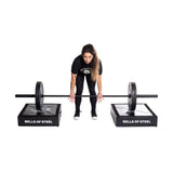 Female athlete deadlifting with a pair of Deadlift Pads