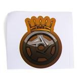 This durable Bells of Steel sticker features a gold crown above a stylized wheel rim with "WILLS OF STEEL" at the center, all set on a white background.