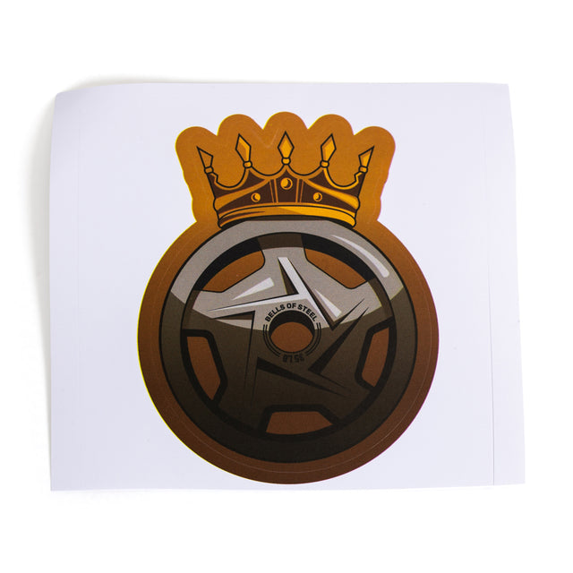 This durable Bells of Steel sticker features a gold crown above a stylized wheel rim with "WILLS OF STEEL" at the center, all set on a white background.