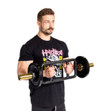 A man with a mustache in a black graphic tee performs a bicep curl with a rectangular trap bar, using Bells of Steel Magnetic Clamp Collars to secure the weights, against a white background.