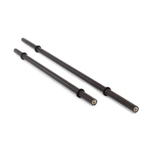 Two Bells of Steel Axle Bars, crafted in black metal with rotating sleeves, are displayed parallel on a white background—ideal for strongman training and enhancing grip strength.