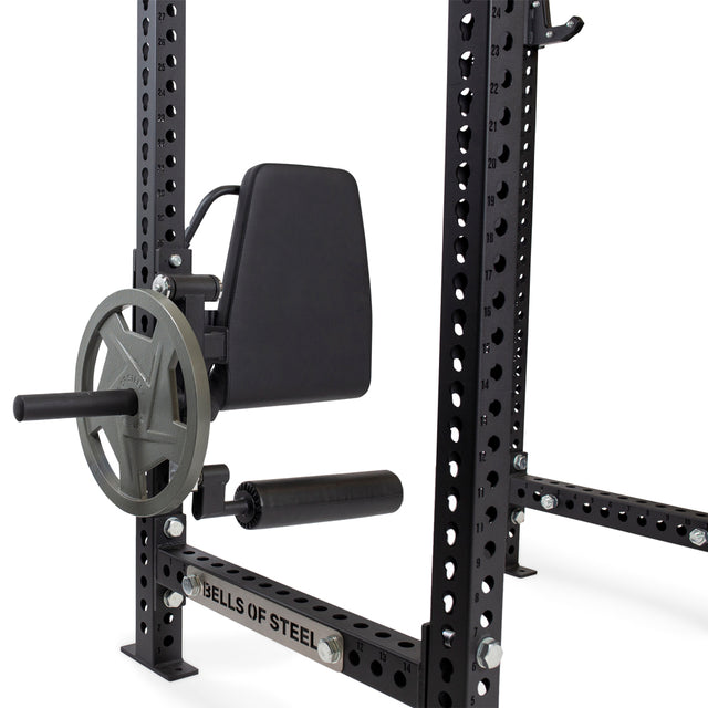 Close-up of a Leg Curl / Leg Extension Rack Attachment, product by Bells of Steel. This steel accessory boasts multiple holes for adjustable positioning and is perfect for home gyms.