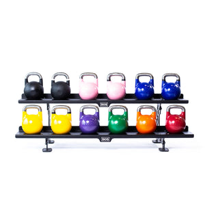 The Bells of Steel Commercial Interchangeable Weight Rack - Components Only neatly displays twelve competition kettlebells in three colorful rows on swappable shelves, organized against a clean white background.