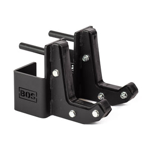 A pair of black Sandwich J-Cups from Bells of Steel, featuring HDPE padding for enhanced durability, designed for fitness equipment. With a sturdy build and bolt details, these j-hooks showcase the "BOS" branding on the side and are positioned side by side against a white background.