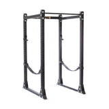 The Bells of Steel Hydra Flat Foot Power Rack Builder features a black metal frame with 3" x 3", ⅝" holes and adjustable safety straps, perfect for weightlifting exercises like squats and bench presses, and offers modular components for customizing Hydra rack attachments.