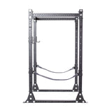 A black Hydra Flat Foot Power Rack Builder by Bells of Steel, featuring adjustable safety bars and multiple ⅝" holes for height customization, complemented by Hydra rack attachments, set against a plain white background.