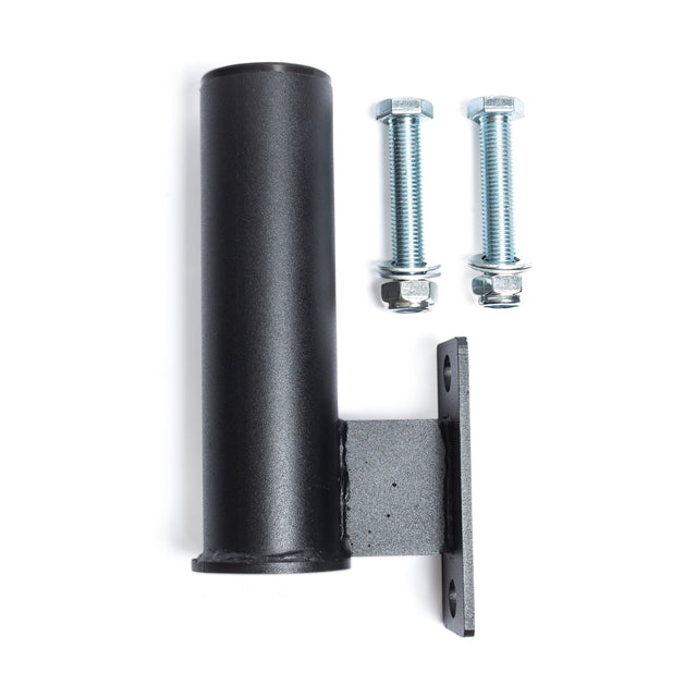 The Bells of Steel Vertical Mount Barbell Holder Rack Attachment, featuring a black metal bracket with a cylindrical holder, stands next to two silver bolts with nuts. Its flat, perforated base facilitates easy mounting on your power rack, making it ideal for home gym organization against the contrasting white background.