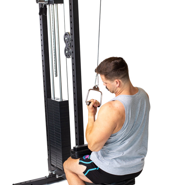 Man exercising with Single D Rubber Handle, emphasizing grip strength