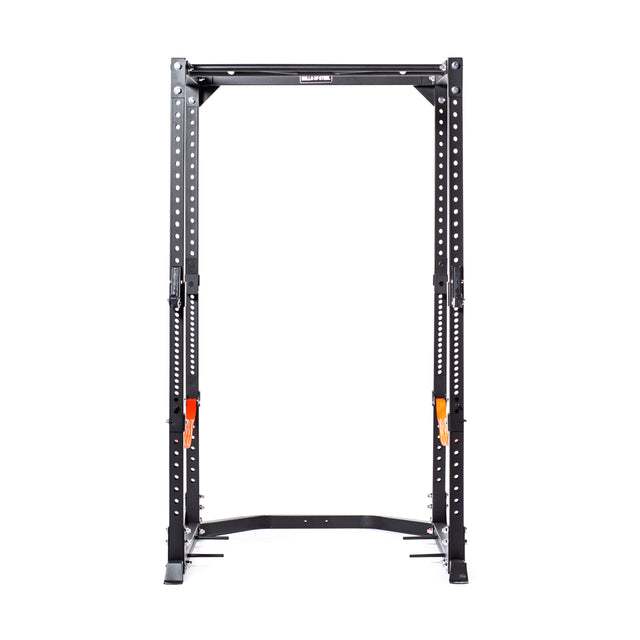 The Light Commercial Power Rack from Bells of Steel is a black metal structure with ⅝" holes, offering adjustable safety bars and multiple customization options. Ideal for weightlifting exercises, this sturdy rack features a rectangular frame that supports the addition of safety straps or resistance bands for enhanced workouts.