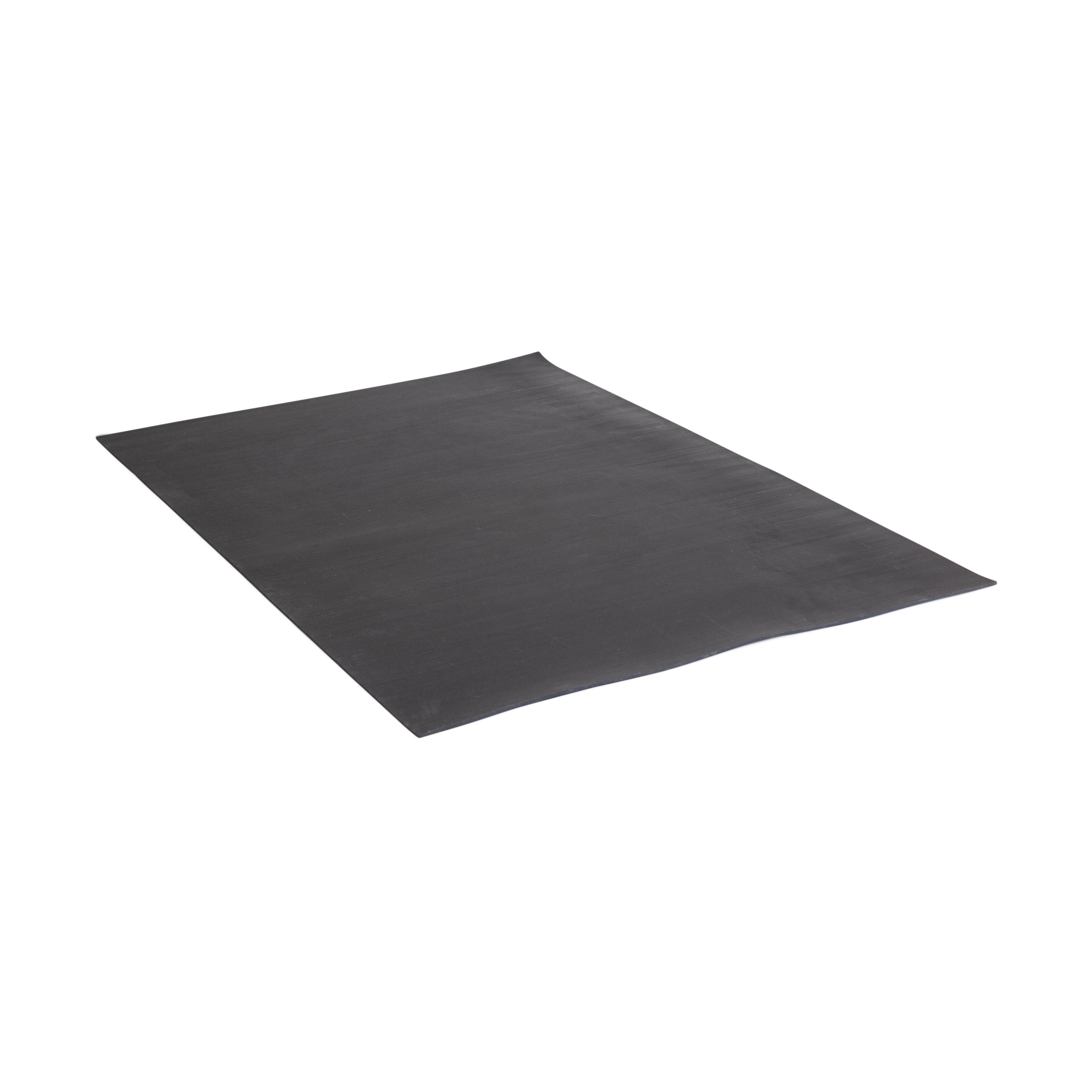 The image displays the Premium Rubber Flooring 4' x 6' by Bells of Steel, a sleek, thin rectangular mat made from recycled rubber. Positioned at a slight angle against a pristine white background, the black mat's robust design emphasizes its heavy-duty nature.