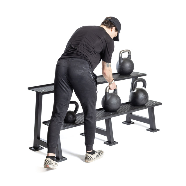 Athlete organizing the Kettlebell Rack