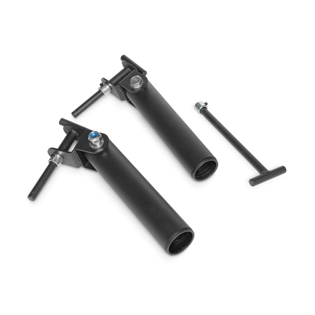 Two black, cylindrical handlebar extensions with metal clamps and bolts lie on a white surface, ready to elevate your workout. A separate T-shaped tool is positioned to the right, perfect for setting up your Bells of Steel Landmine Rack Attachment.