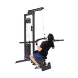 Male athlete doing wide grip pull down using Lat Pulldown Low Row Machine