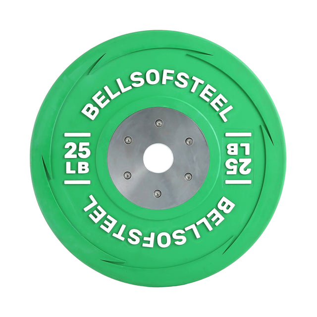 A Bells of Steel LB Competition Bumper Plate in green, weighing 25 pounds, is ideal for strength training. This weightlifting plate features a metal center with six rivets, making it perfect for those focusing on Olympic lifting.