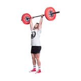 Male athlete perform overhead lifting using LB Competition Bumper Plates