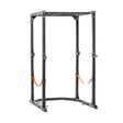 The Bells of Steel Light Commercial Power Rack (2.3" x 2.3", ⅝" holes) is a black steel, freestanding rack with adjustable holes and orange safety straps, ideal for weightlifting and strength training at home or in light commercial gyms.