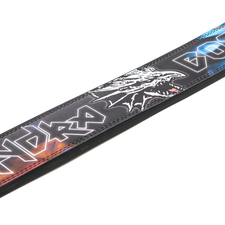 A close-up of the Bells of Steel Lever Belt in black, featuring a white dragon head design and glowing stylized text on a dark, colorful background.