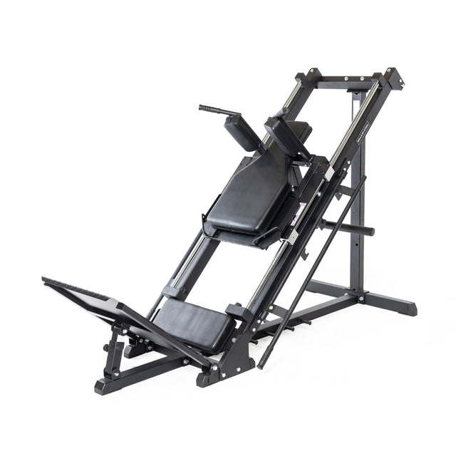 The Leg Press Hack Squat Machine by Bells of Steel is a black gym equipment featuring a padded backrest and footplate. It has an angled sturdy metal frame for effective leg exercises, with notable sled capacity, supporting hack squat positions for versatile workouts.