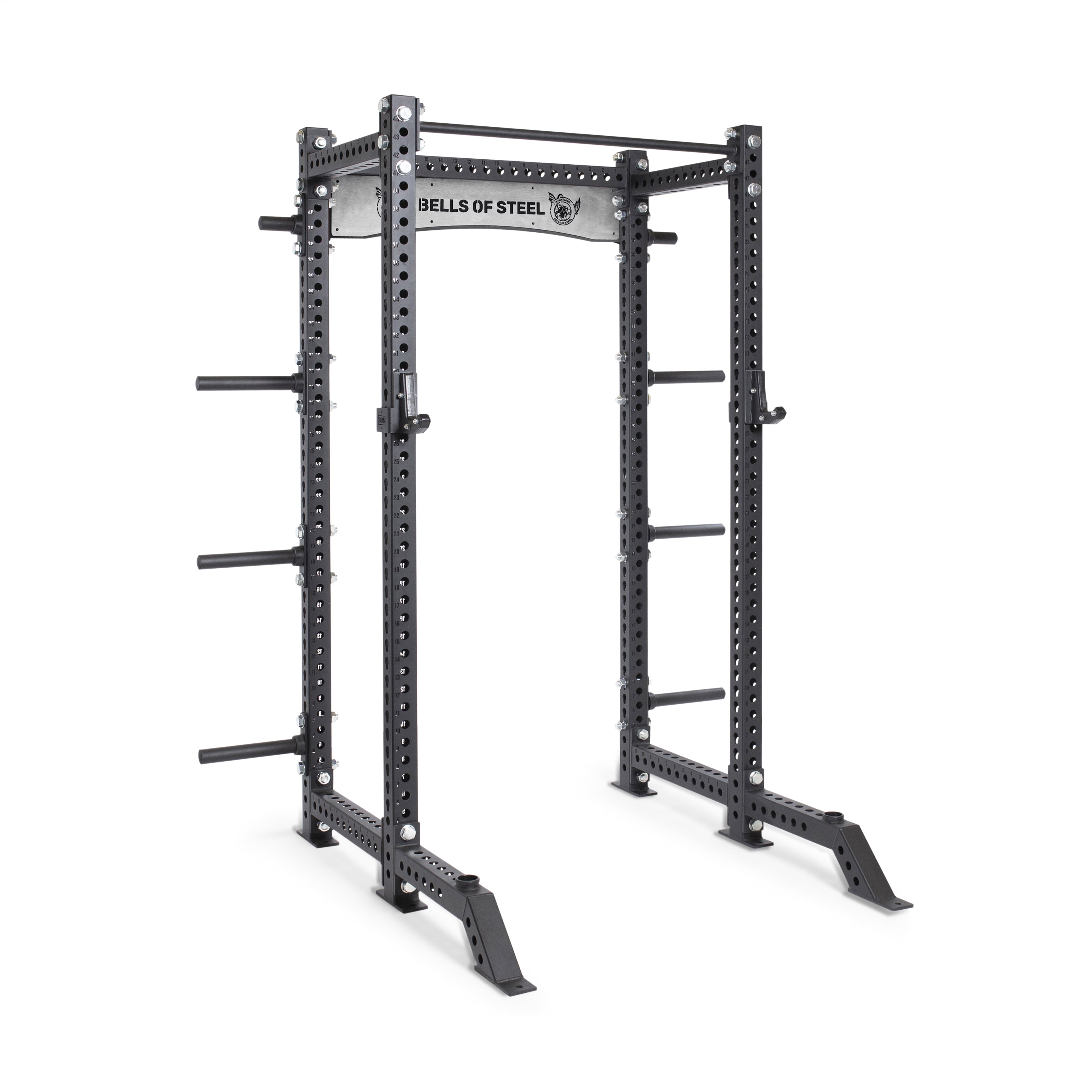 A robust black power rack, the Manticore Collegiate Power Rack - Prebuilt (3" x 3", 1" Holes), featuring multiple adjustment holes and weight pegs, is ideal for keg stand train routines. This rack, branded with "Bells of Steel," is designed for strength training exercises such as squats and bench presses.