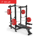 The Bells of Steel Manticore Folding Power Rack Builder (3" x 3", 1" Holes) in black and red, shown with a bench, barbells, and red plates. A top-left red banner displays "10% off." Ideal for any home gym. Plain white background.