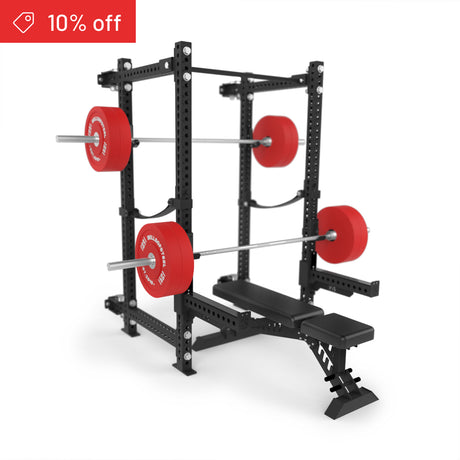 The Bells of Steel Manticore Folding Power Rack Builder (3" x 3", 1" holes) comes with a bench and red weight plates on barbells. A red "10% off" label appears at the top left, all set against a white background—ideal for any home gym.