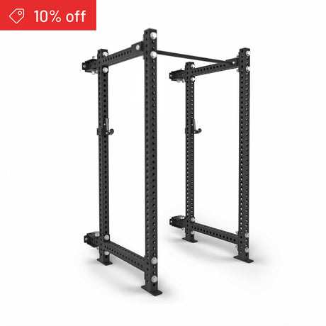 The Bells of Steel Manticore Folding Power Rack Builder (3" x 3", 1" Holes) stands sturdy on a white background, with a "10% off" red label and price tag icon—ideal for upgrading your home gym setup.