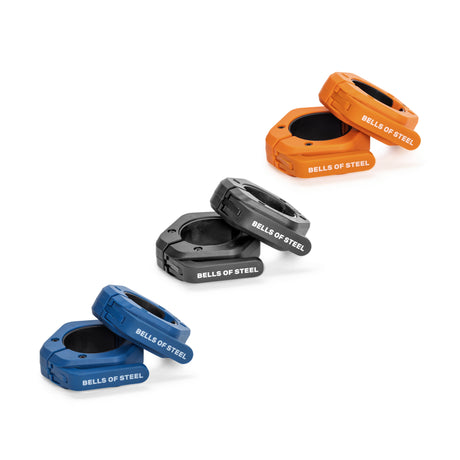 Three pairs of Bells of Steel Magnetic Clamp Collars in blue, black, and orange are stacked diagonally on a white background. Each collar features the "BELLS OF STEEL" logo in white text.