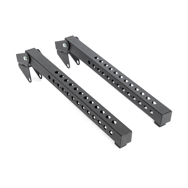 Two black metal bars, like Bells of Steel's Lever Arms Rack Attachment, feature multiple holes with angled brackets at one end. Positioned parallel on a plain white background, they evoke the precision and adaptability of an adjustable pull-up bar in a minimalist setting.