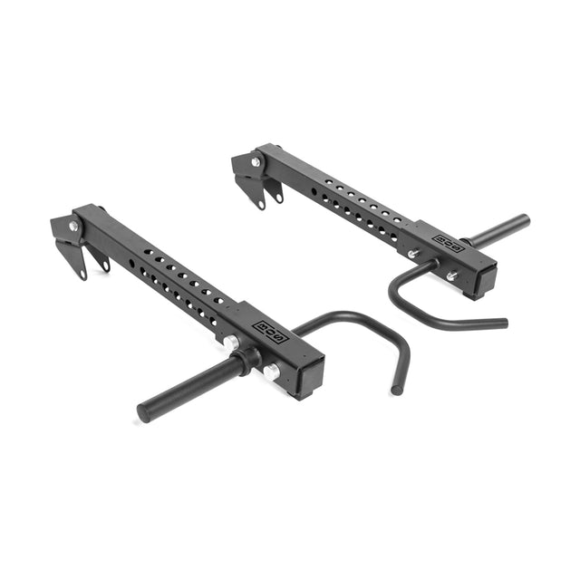 The Bells of Steel Lever Arms Rack Attachment includes two black detachable pin/pipe safety spotter arms with adjustable holes and locking mechanisms. These arms are designed for power racks, support up to 500lbs, and feature padded hooks and handles for safer weightlifting.
