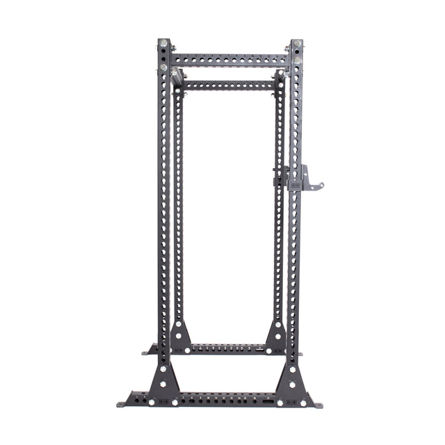 The Manticore Flat Foot Power Rack Builder by Bells of Steel is a black, freestanding unit designed for weightlifting and strength training. It boasts a 1,000-pound capacity and features multiple 1-inch holes for adjustable height settings. Constructed with a sturdy metal frame measuring 3" x 3", it offers excellent stability within an open ecosystem.