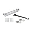 A steel bar marked "Bells of Steel" sits among bolts, nuts, and washers from the Manticore Hardware kit. A 13/16" and 20 mm black combination wrench is nearby for easy assembly of your Manticore Power Rack against a plain white backdrop.