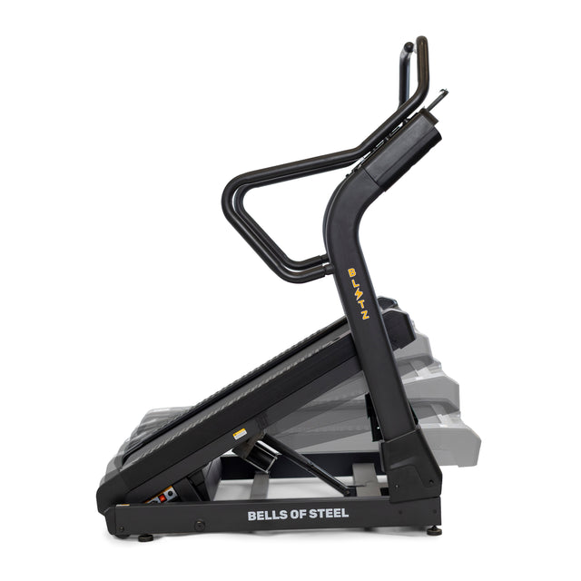 Side view of the black Blitz Mountain Climber Treadmill with a steep incline, handlebars, and "Bells of Steel" on the base. Its modern design includes FTMS Bluetooth connectivity and a sleek, sturdy frame for serious workouts.