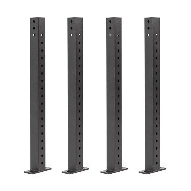 Four tall black metal posts with multiple circular holes run vertically down each post, reminiscent of Bells of Steel's Folding Rack Wall Connectors & Hinges. They are evenly spaced and stand upright on a white background.