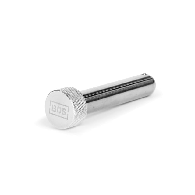 A sleek metallic knob by Bells of Steel, named Magnetic Rack Attachment Pins, is made from anodized aluminum with a textured grip and engraved "BOS." It has a magnetic head and is set at a slight angle on a plain white background.